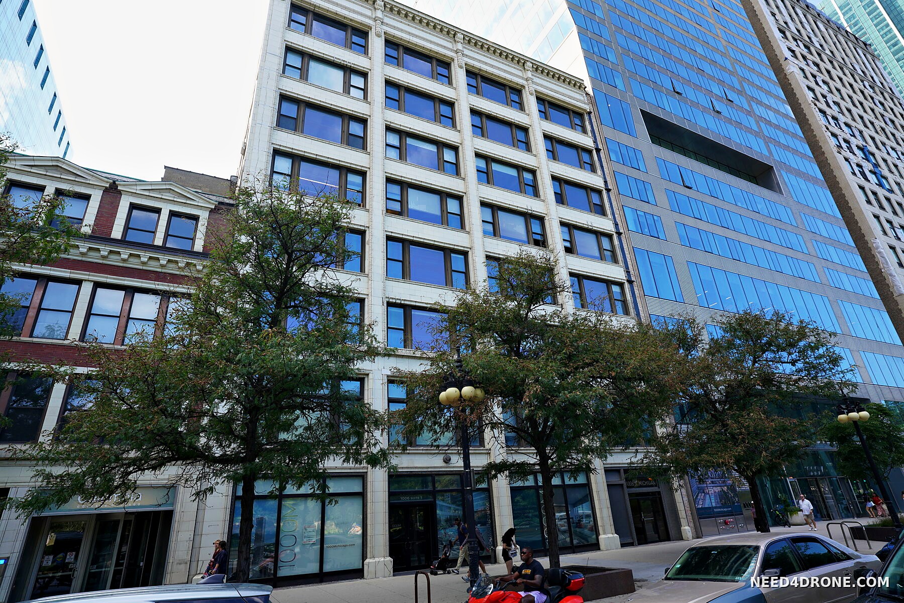 Building next to the adjacent glass tower